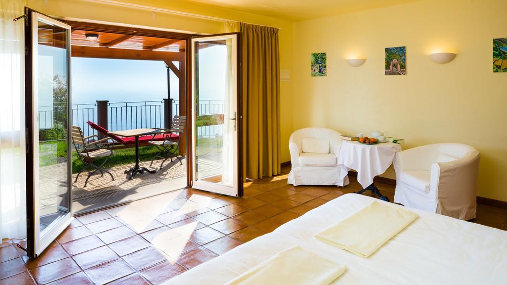 Atrio Hotel Estreito Da Calheta Værelse billede